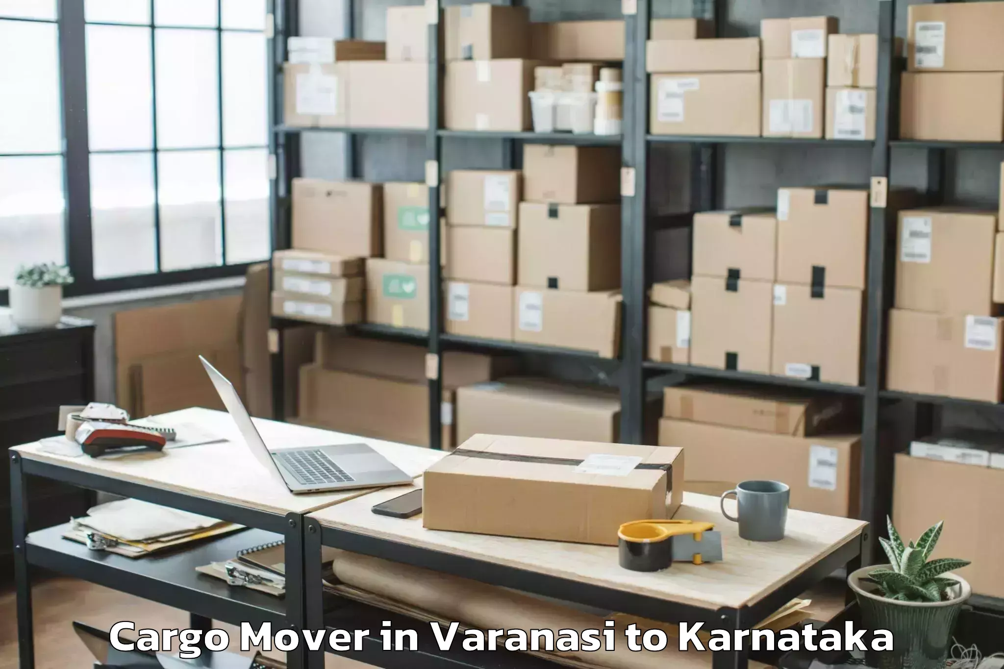 Leading Varanasi to Karnataka State Rural Developm Cargo Mover Provider